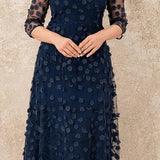 Robe longue brodée à fleur couleur bleu marine