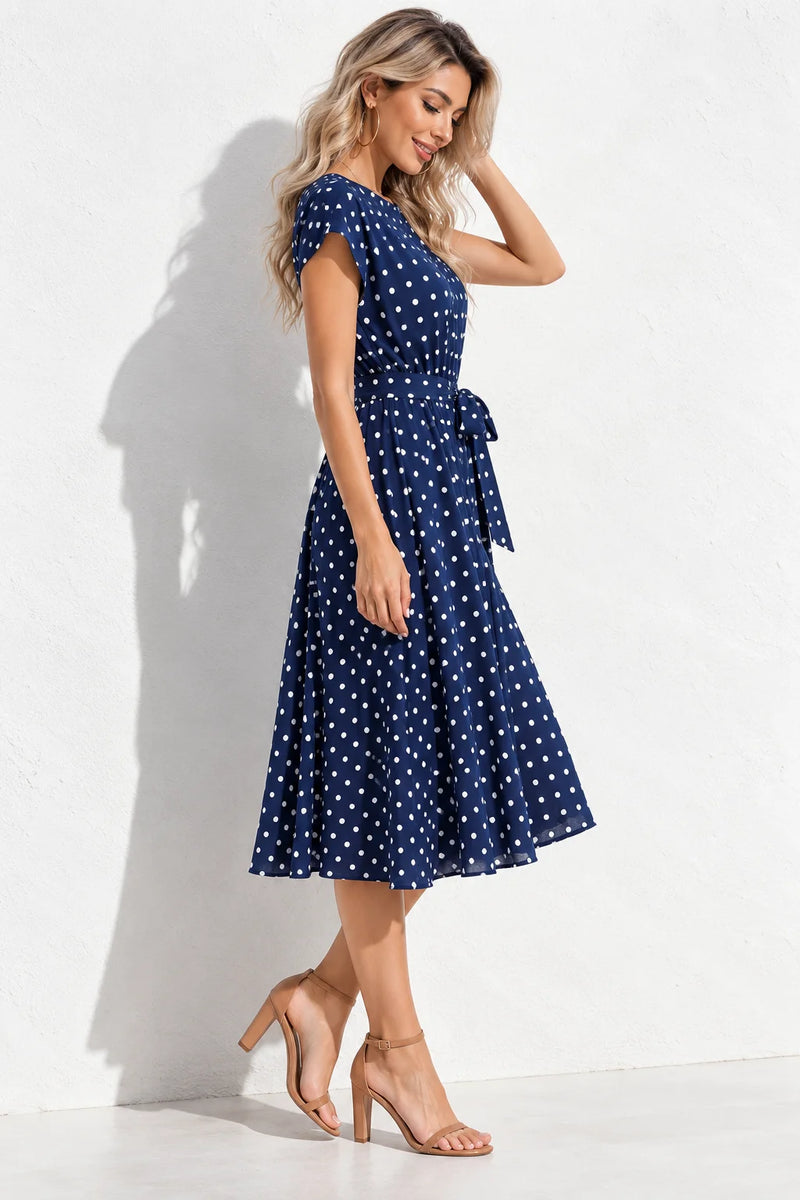 Robe bleu marine à pois blanc