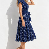 Robe bleu marine à pois blanc