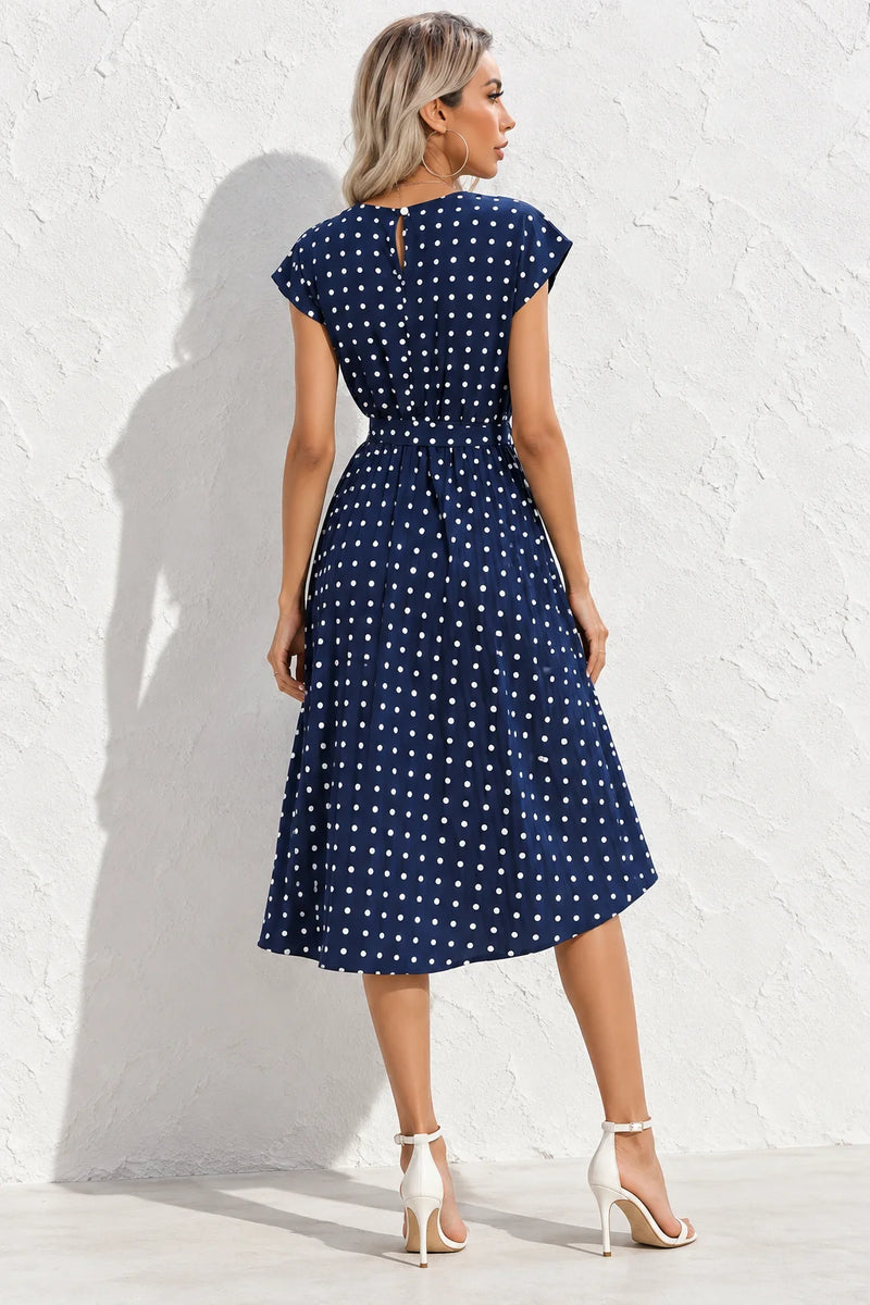 Robe bleu marine à pois blanc