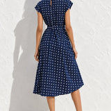 Robe bleu marine à pois blanc