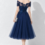 Robe bleu marine dentelle et tulle