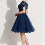Robe bleu marine dentelle et tulle