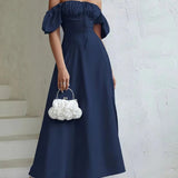 Robe longue couleur bleu marine fendue