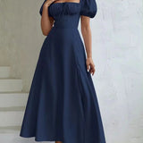 Robe longue couleur bleu marine fendue