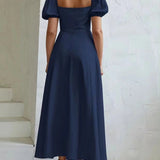 Robe longue couleur bleu marine fendue